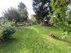 Kleines Familienglück: Top-gepflegter Bungalow mit perfektem Garten und Aufstockungspotenzial - Gartenansicht